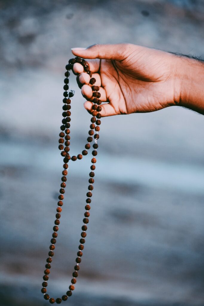 Bead necklace being held