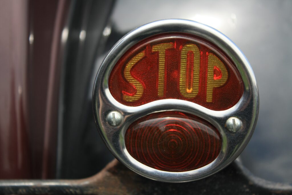 close-up photography of stop button