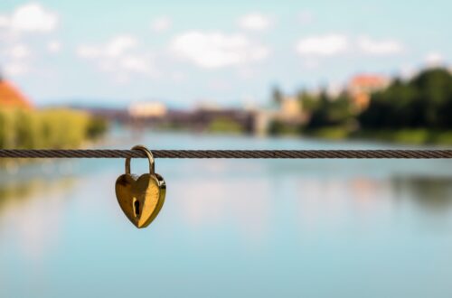 heart brass-colored padlock